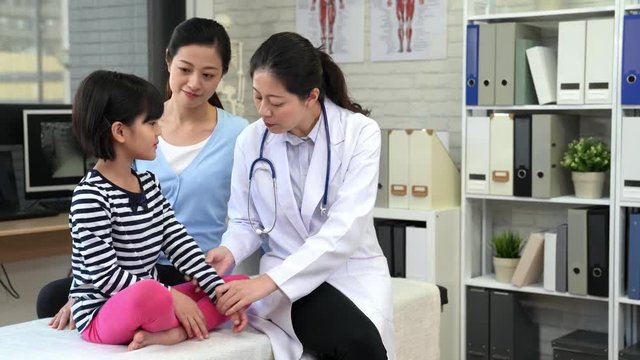 mother brings her daughter to see doctor