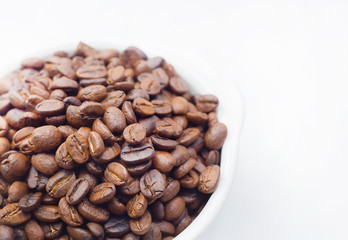 roasted coffee beans on white background space modern style.