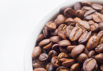 roasted coffee beans on white background space modern style.