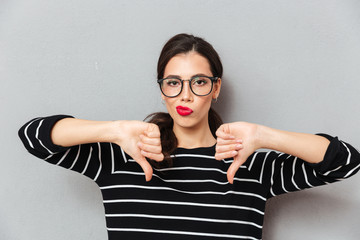 Portrait of a unsatisfied woman in eyeglasses