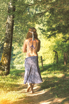 Pretty free hippie girl. Peace. Body painting - Vintage effect photo effect