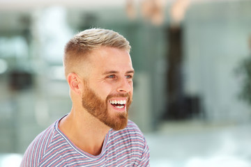 Obraz premium young man with beard laughing