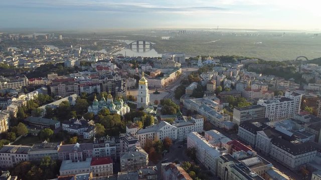 Kiev city center in morning lights. Dnipro river and Sophia Cathedral of Kiev, Ukraine. Aerial drone shot. 4K, UHD