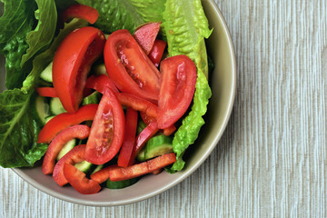 Vegetable salad in a bowl, copy space.