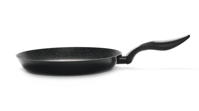 Black frying pan with handle on white background