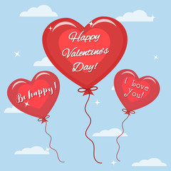 Fototapeta na wymiar Three red balloon with the text of congratulations on Valentine's Day in the sky.