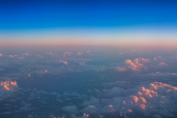 Flying above the clouds. view from the airplane window
