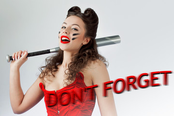 Don't forget Valentine's day. Woman in red with a bat in war paint. Laughs and threatens