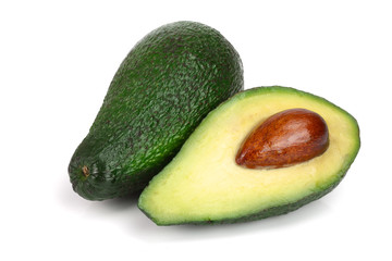 whole and half avocado isolated on white background close-up. Top view