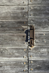 Closed with a handle door of boards