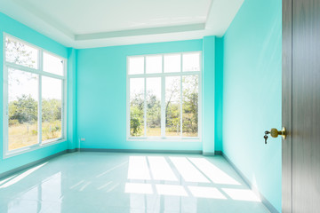 Fototapeta na wymiar Construction Home Empty Room Blue color interior window white aluminum on wall