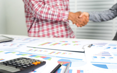 Elderly husband and wife shaking hands
