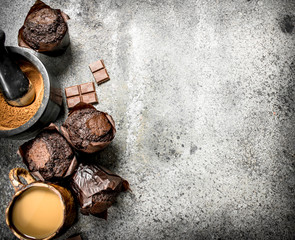 Chocolate muffins with coffee and cocoa.