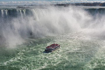 Tourist ship on Horseshoe Fall, Niagara Falls, Ontario, Canada. 