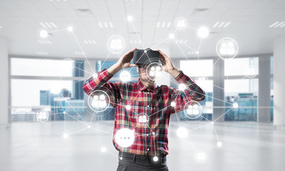 Guy wearing checked shirt and virtual mask demonstrating some emotions