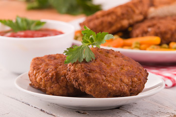 Meatballs on white dish. 