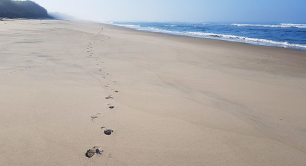 Traces on sand from sea water. Textures