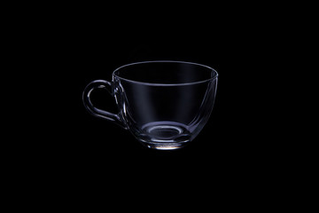 Glass cup transparent isolate on black background