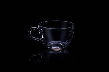 Glass cup transparent isolate on black background