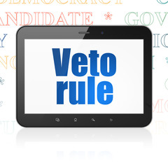 Politics concept: Tablet Computer with  blue text Veto Rule on display,  Tag Cloud background, 3D rendering