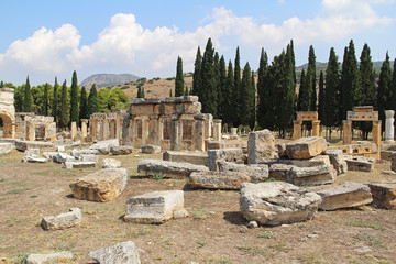 The ruins of the ancient Hierapolis city next to the travertine pools of Pamukkale, Turkey.