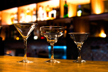 Martini glasses and margaritas on the bar