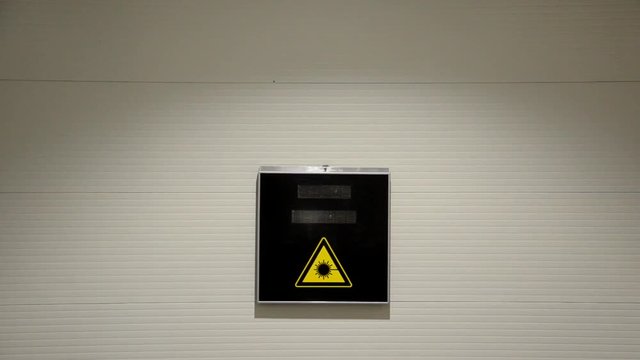 View of laser hazard sign in a lab