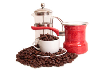 Coffee beans and a white cup on white background