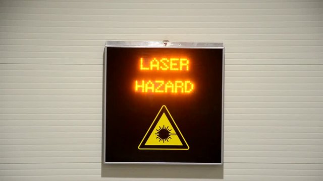 View of laser danger sign in a lab