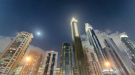 Downrtown skyline along Sheikh Zayed Road at night, Dubai