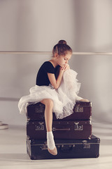 The little girl as balerina dancer sitting at studio © master1305