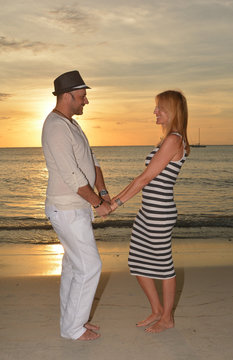 Beautifull Forty Five Years Old Couple On The Beach At Sunset