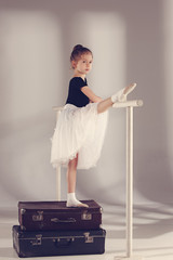 The little girl as balerina dancer standing at studio © master1305