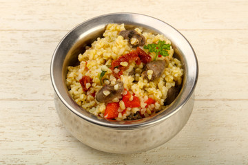 Bulgur with chicken hearts