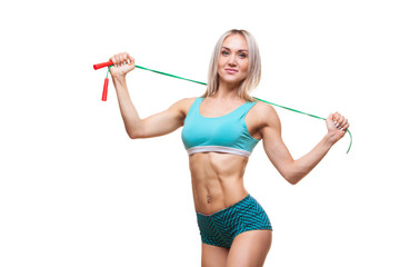 Fototapeta na wymiar Sport, activity. Cute woman with skipping rope. Muscular woman white background.