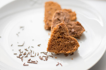 Chocolate plum cake heart with chocolate decoration