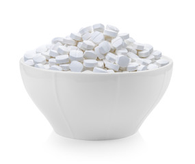 Fototapeta na wymiar pills bowl on white background