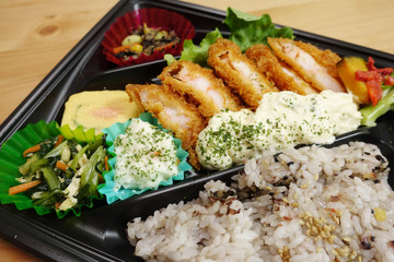 Fototapeta na wymiar Ebikatsu bento (Prawn cutlet rice plate) with mixed grain rice