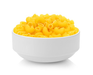 dry macaroni in a bowl on white background