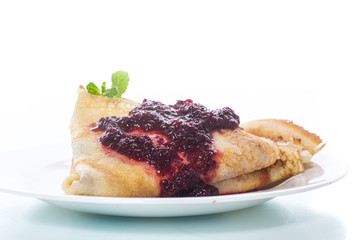 thin delicious pancakes in a plate