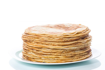 thin delicious pancakes in a plate