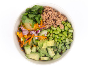 Buddha bowl of mixed vegetable with avocado and tuna fish