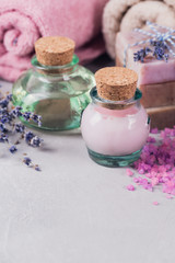 Obraz na płótnie Canvas Natural cosmetic oil, cream, sea salt and natural handmade soap with lavender