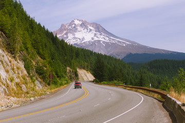 Highway road in mountains with Mt. Hood in the background in Oregon, USA - 187616951