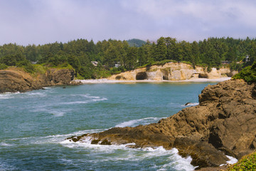 Beach and coastline covered in fog in Oregon, USA