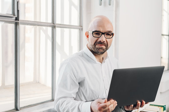 Businessman staring intently at the camera