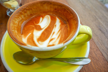 Empty coffee cup after drink on wood table