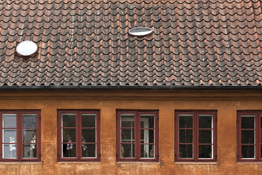 Orange House in Copenhagen with Windows