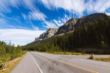Scenic Icefields Parkway highway in Rocky Mountains, Alberta, Canada on sunny day