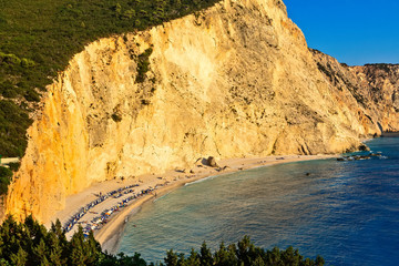 People swim in the sea at Porto Katsiki Beach in Lefkada Island, Greece